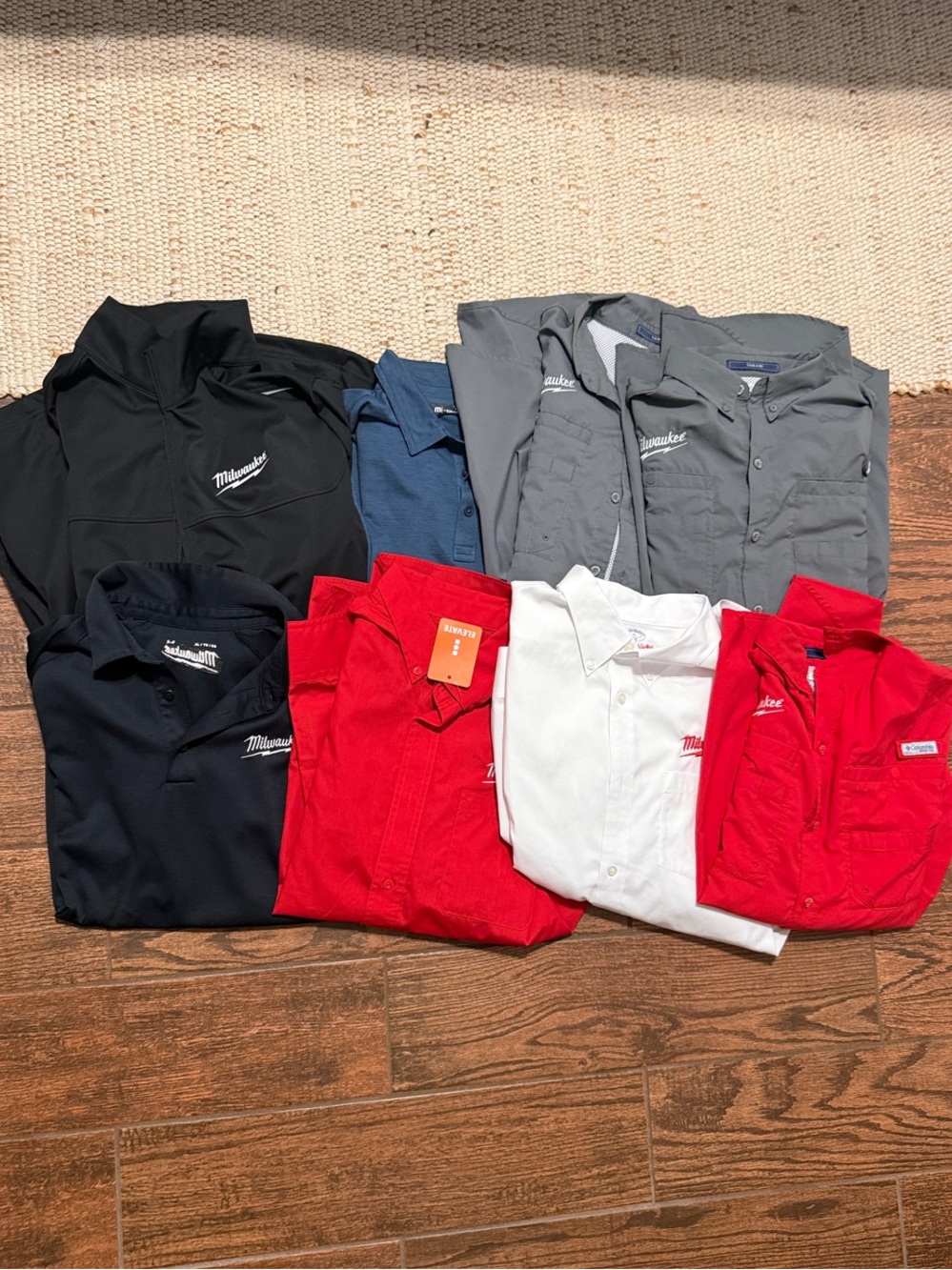 Assortment of Milwaukee Tool Polos and Jacket